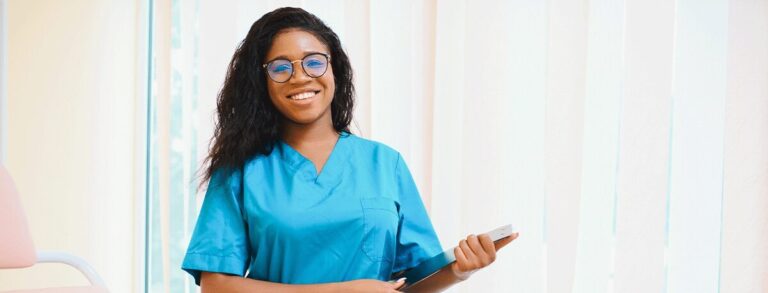 A healthcare professional standing in an exam room with a clipboard, ready to provide compassionate care while helping a patient understand whether her pregnancy is viable or ectopic through pregnancy testing and ultrasound.